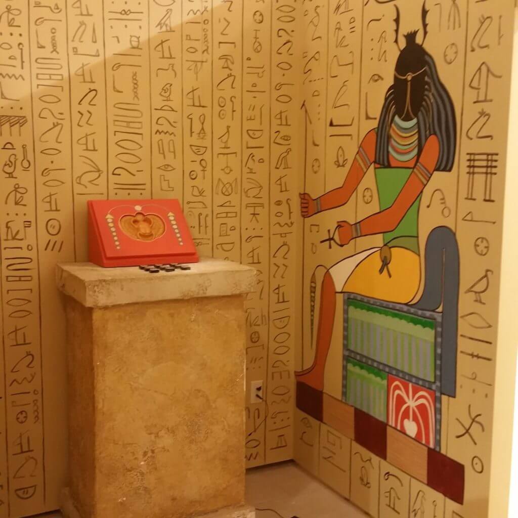 escape room wall with hieroglyphics